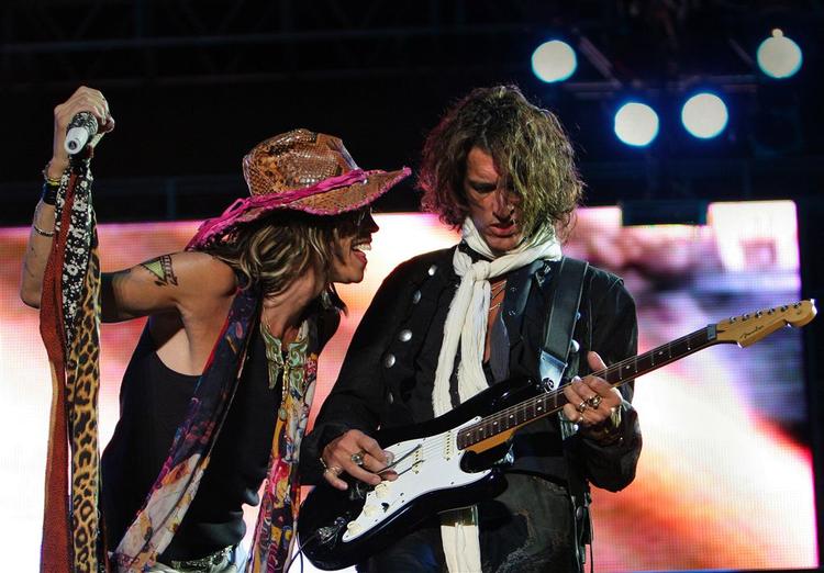 Aerosmith to mest profilerede medlemmer, Steven Tyler, til højre, og Joe Perry, til venstre. 