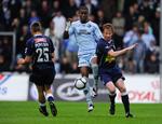 Tempoet i kampen mellem Randers og AGF dalede hurtigt. Her er det kampens to målscorere, Bedi Buval og Dan Thomassen i aktion. 