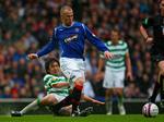 Rangers FC og Kenny Miller (i blåt) vandt det seneste lokalopgør over Celtic med 1-0, hvilket blev udslagsgivende for årets skotske mesterskab. Arkivfoto. 