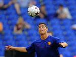 Inden for en halv time har Christiano Ronaldo bragt Manchester United foran 1-0 mod Barcelona i Champions League-finalen, spår bookmakerne. Her ses Ronaldo under træningen i går. 
