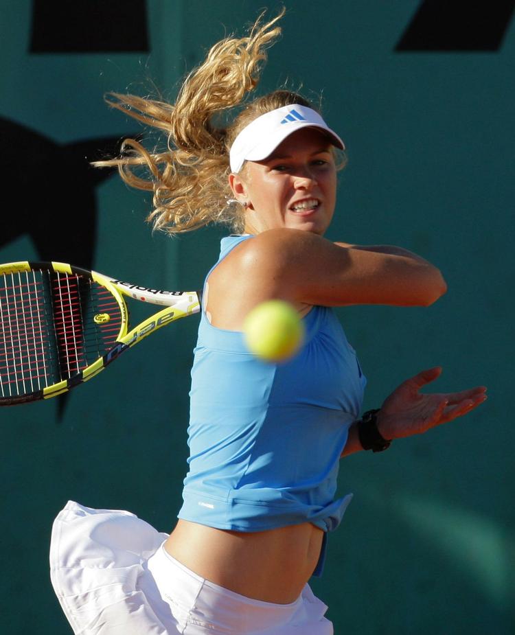 Caroline Wozniacki fotograferet under dagens kamp, hvor hun led meget. 