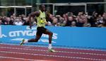 Supersprinteren fra Jamaica, Usain Bolt, kan også løbe hurtigt på 150 meter, selv om det ikke er en olympisk disciplin. Her sætter han rekord på distancen ved et gadeløb i Manchester 17. maj. Arkivfoto. 