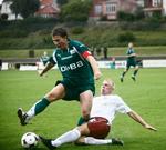 Jesper Münsberg (i hvidt) i kamp for Lolland Falster Alliancen mod sin tidligere klub, Næstved. Arkivfoto. 