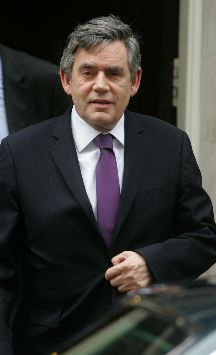 Det var en smilende Gordon Brown, der tidligere i aften ankom til et skæbnemøde med hans partifæller. 