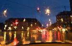 Vinduesviskerne er kommet på overarbejde i København. Billedet er taget gennem forruden på fotografens bil i aftes. 