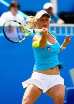 Caroline Wozniacki leverede en række fejl i en vindblæst forestilling ved semifinalen mod Alexandra Wozniak. Men danskeren er videre til finalen. Arkivfoto. 