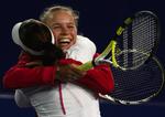 Caroline Wozniacki og Anabel Medina Garrigus spillede sammen for første gang, da de vandt turneringen i Beijing. 