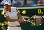 Caroline Wozniacki fik ikke lejlighed til at nyde sejrens sødme efter udklasseringen af Maria Kirilenko. Kort efter stod den på doublekamp med makkeren Sorana Cirstea. 