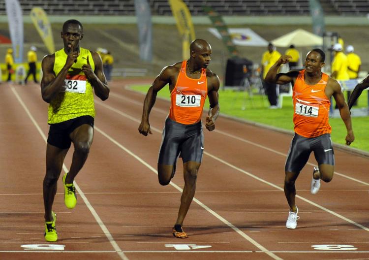 Usain Bolt (tv.) viste igen ved de jamaicanske mesterskaber, at han er den stærke sprinternations bedste bud på en VM-titel i Berlin senere på sommeren. 