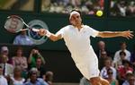 Roger Federer tæmmede den frygtede servespecialist Ivo Karlovic og er klar til sin 21. grand slam-semifinale på stribe. 