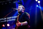 Koncerten med britiske Elbow blev trods den fint doserede tristesse en lidt uforløst optakt til lørdag aften. Her bandets skæggede sager Guy Garvey. 