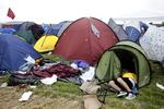 Det var tæt på at få katastrofale følger, da en beruset mand i morges satte ild til en række telte på Roskilde Festival. Manden på billedet har ikke noget med den konkrete sag at gøre. Arkivfoto. 