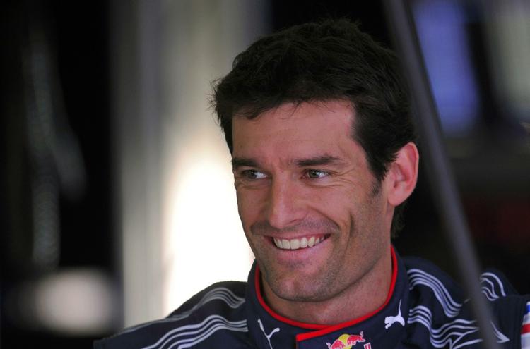 Mark Webber havde - med rette - det brede smil fremme, da han sikrede sig poleposition til det tyske grandprix på Nürburgring. 