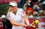 Caroline Wozniacki roste sin modstander for en god indsats. Arkivfoto. 
