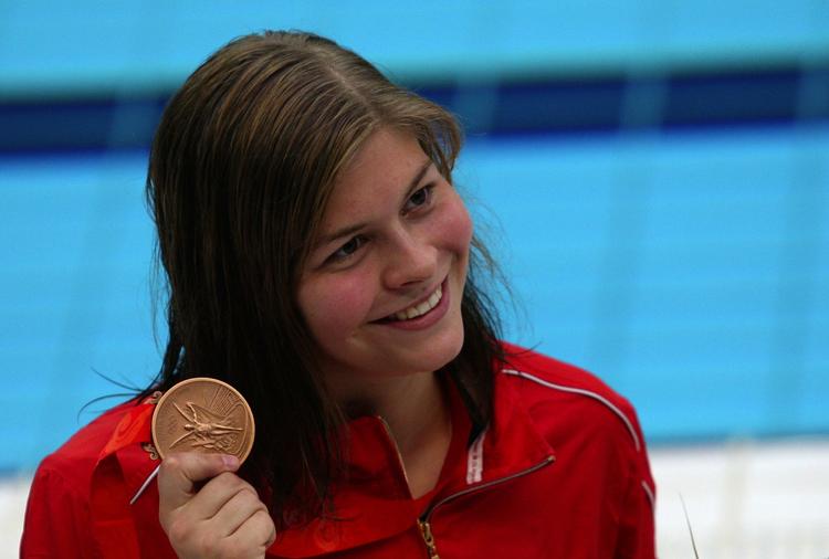 OL-bronzevinderen Lotte Friis og de øvrige topatleter skal nok klare sig, men det er de kommende stjerner, der bliver ramt af Team Danmarks besparelser. Arkivfoto. 