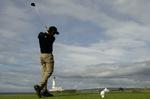 Vinden spiller spillerne et puds ved British Open i golf. 