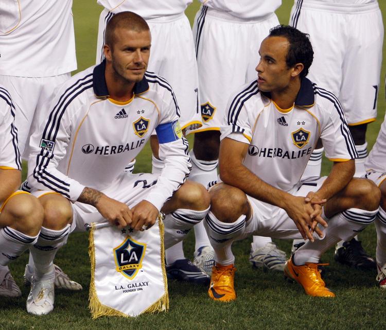David Beckham (tv.) er kommet i udnåde på den amerikanske vestkyst efter sit eventyr i italienske AC Milan. Arkivfoto. 
