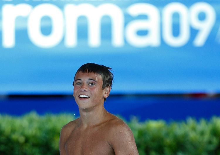 Tom Daley havde det helt store smil på, da han steg op af bassinnet som verdensmester. 
