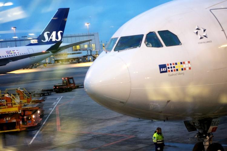 SAS er hårdt trængt i øjeblikket, og forhandler blandt andet med kabinepersonalet om at gå ned i løn. (Arkivfoto) 