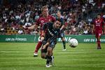 FCN's Morten Karlsen (bageste) og Mikkel Beckmann (forrest) fra Randers FC i kampe om bolden i søndagens 2-2-kamp i Farum. 