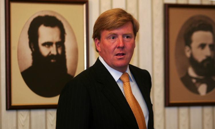 Kronprinsen Willem-Alexander er villig til at droppe retssagen, hvis AP trækker billederne tilbage. 