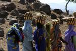 Kvinder fra Darfur fotograferet i en FN-flygtningelejr i Chad sidste år. 