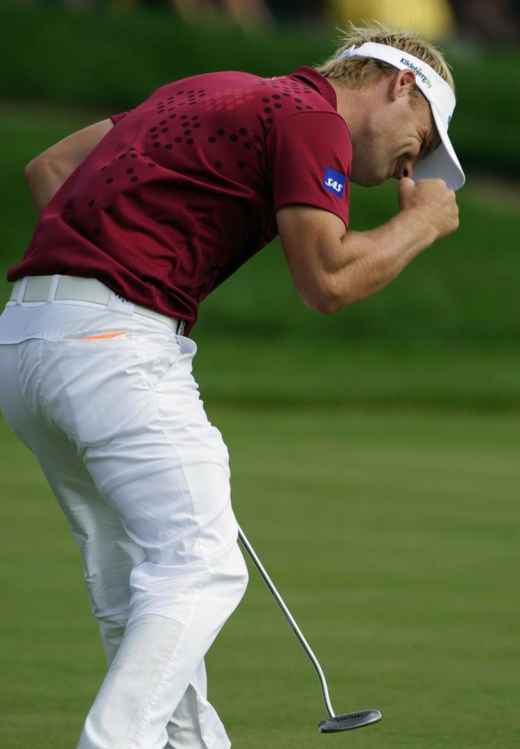 Søren Kjeldsen jubler over en birdie på 7. hul i finalerunde i årets sidste majorturnering, US PGA Championships. 