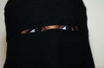 Burka og nikab - som ses her på billedet - bør forbydes i det offentlige rum, mener Konservativt Folkeparti. 