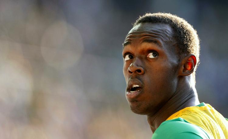 Jamaicas Usain Bolt skæver op mod tiden efter et af sine hurtige løb ved VM i Berlin. Dopingrygter blev hurtigt manet i jorden efter verdensrekorden på 100 meter. 