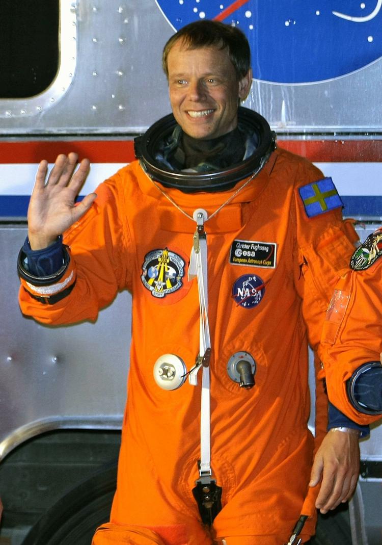 Smil på læben og flag på skulderen. Christer Fuglesang er klar til takeoff. 