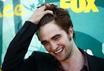 Den 23-årige engelske skuespiller Robert Pattinson er en af tidens største idoler. Det er særligt rollen som Edward Cullen i 'Twilight', der har gjort ham til teenagepigernes nye helt. Pattinson huskes også for rollen som Cedric Diggory i 'Harry Potter og flammernes pokal'. Arkivfoto. 