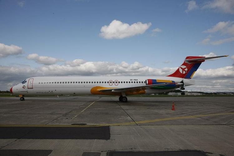 De afviste irakeres rejse fra Odense til Iraks hovedstad Bagdad varede knap syv timer. Flyet er fra det lille danske luftfartsselskab DAT 