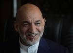 Præsident Hamid Karzai kan smile over valgresultaterne. Men han er stadig ikke sikker på at undgå en anden valgrunde. 