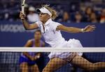 Caroline Wozniacki er færdig i double i US Open. I nat spiller hun fjerde runde i single. 