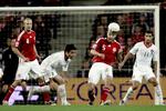 Michael Silberbauer header væk, før Deco kan komme til bolden under kampen lørdag mellem Danmark og Portugal. Arkivfoto. 