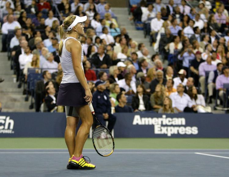 Melanie Oudin kigger op mod den nedslående stilling undervejs i kampen med Caroline Wozniacki. 