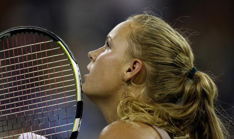 Caroline Wozniacki har forelsket sig i millionbyen New York - og amerikanerne har taget den unge dansker til sig på tennisbanerne. 