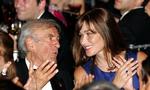 Den tidligere model Carli Bruni Sarcozy, der nu er gift med Frankrigs præsident, kunne være en af dem, der kaster mænds mentale balance ud af kurs. Arkivfoto fra en velgørenhedsmiddag i New York i 2008. 