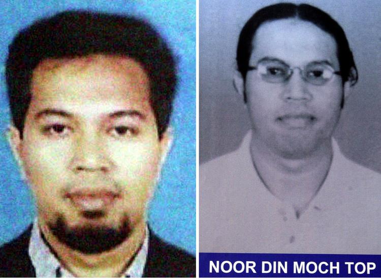 Dette foto, der er frigivet af det indonesiske politi, viser til højre det nyeste billede Noordin Muhammed Top. 