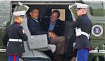 Det er »absolut« muligt, at Barack Obama, siger hans pressesekretær Robert Gibbs, der her ses sammen med sin chef 