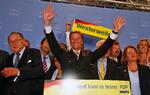 Angela Merkel fortsætter som kansler, men det bliver på 'Guidos nåde'. Guido Westerwelle og det liberale parti FDP er tilbage i regering efter 11 år i opposition. 