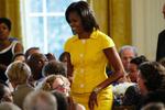Michelle Obama er glad for stærke farver som gul, turkis og rød. Ikke kun fordi de klæder hende, men også fordi de udstråler glæde og optimisme, siger Covers Sara Sievers. Arkivfoto. 