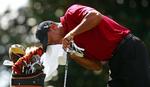 Man kan blive helt svedig ved tanken, men Tiger Woods har altså tjent et beløb svarende til over 5.000.000.000 kroner på sine evner som golfspiller. Arkivfoto. 
