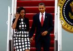 Michelle og Barack Obama forlader præsidentflyet på Andrews Air Force Base i USA efter det forgæves besøg i København. 