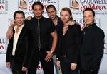 Et billede af det genforende Boyzone fra sidste år. Yderst til venstre står Stephen Gately som i går blev fundet død på Mallorca. 