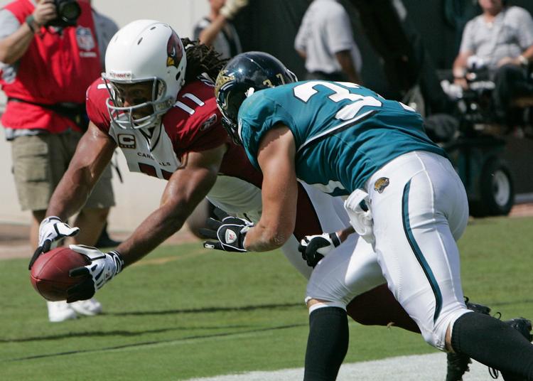 Arizona Cardinals Larry Fitzgerald på vej mod et touchdown i kampen mod Jacksonville Jaguars. Arkivfoto. 