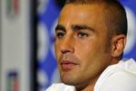 Fabio Cannavaro kan igen koncentrere sig om fodboldem efter at den italienske olympiske komité har droppet dopingsagen mod ham. Arkivfoto. 