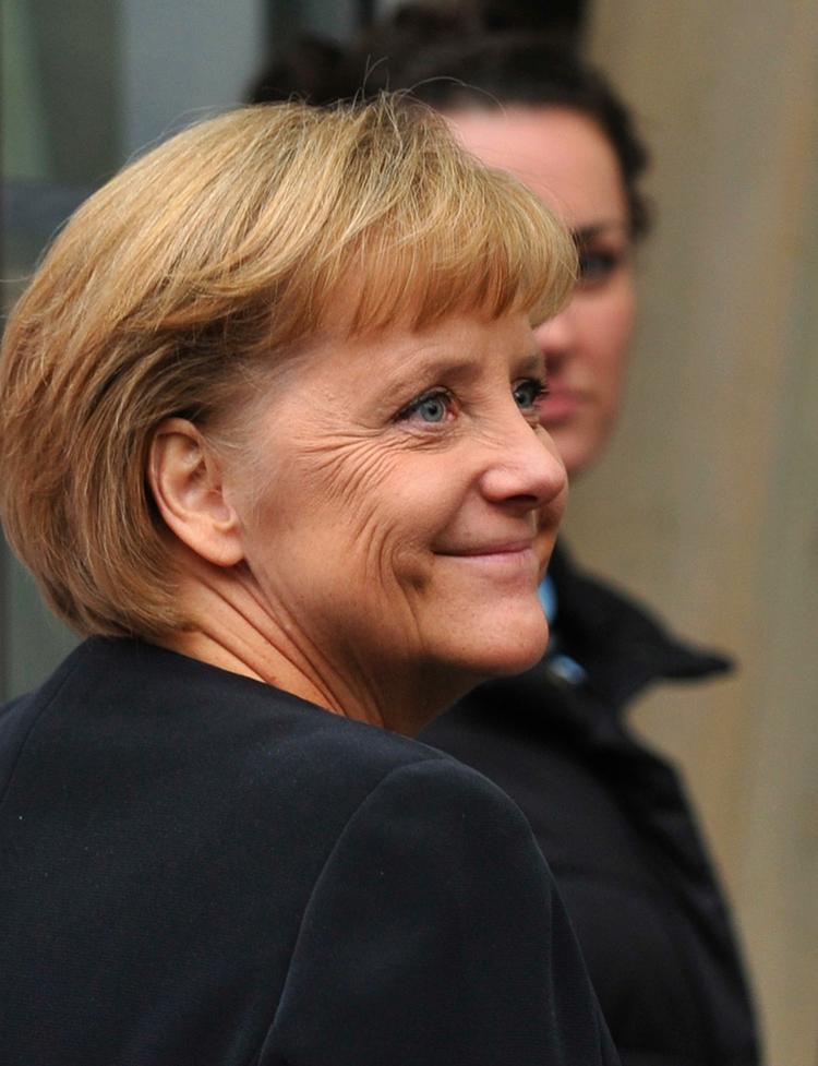 Optimistisk. Kansler Angela Merkel fotograferet da hun ankom til forhandlingerne i går. 