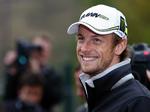 Underbetalt. Verdensmester Jenson Button kan se frem til en klækkelig lønforhøjelse i næste sæson. Arkivfoto. 