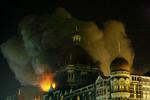 Billede fra terrorangrebet mod Mumbai sidste år, hvor mindst 174 mennesker mistede livet. 